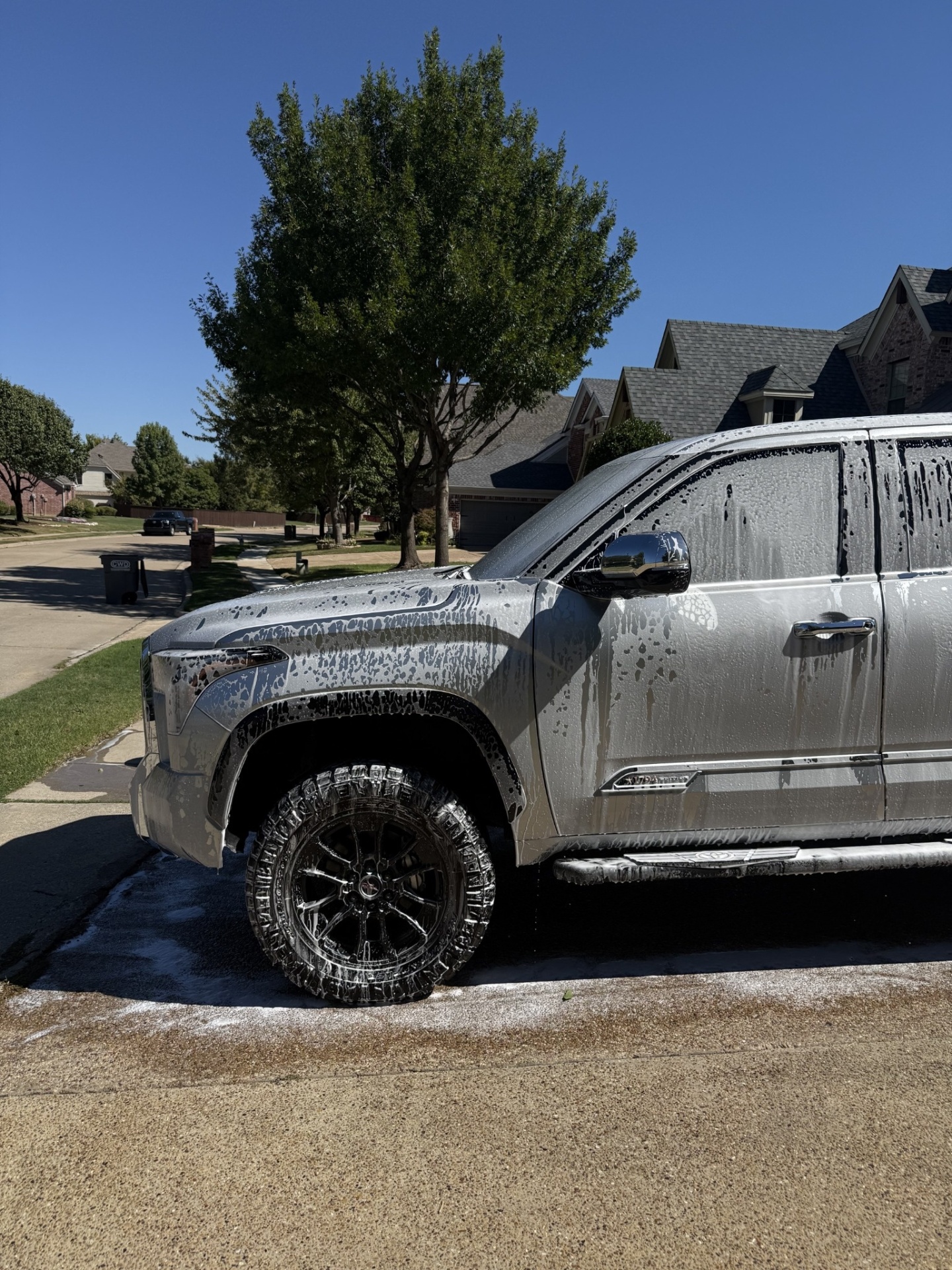 Silver pickup truck mid foam wash