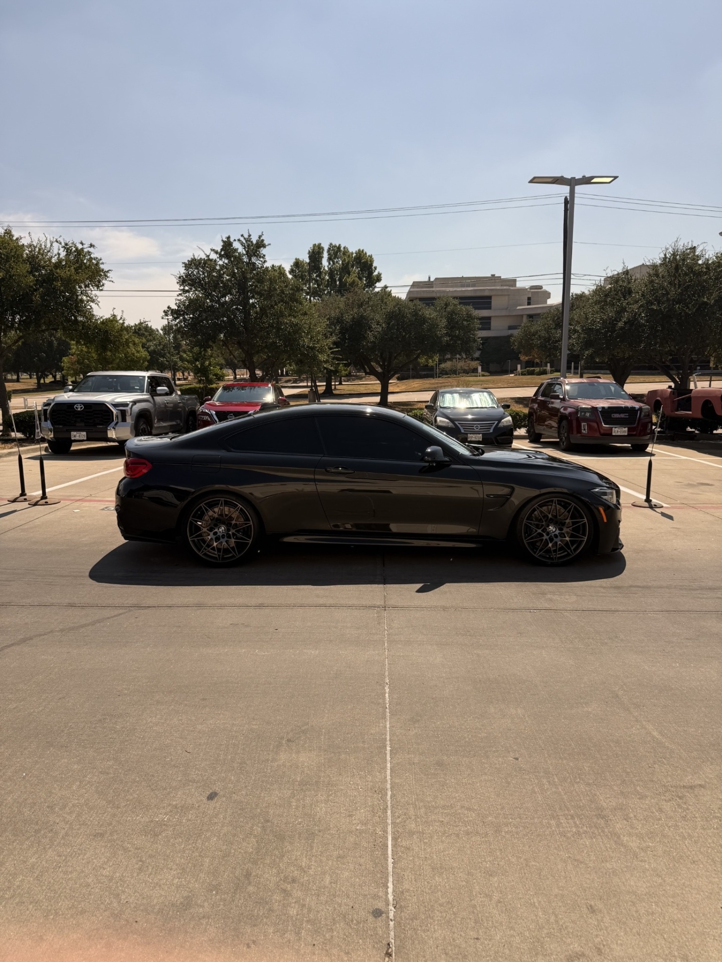 Black sports coupe after a fresh detail